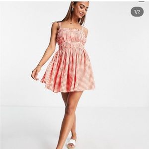 ASOS DESIGN strappy mini skater sundress in red textured gingham